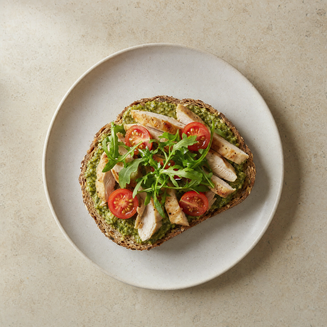 Chicken and pesto snack on whole-grain bread
